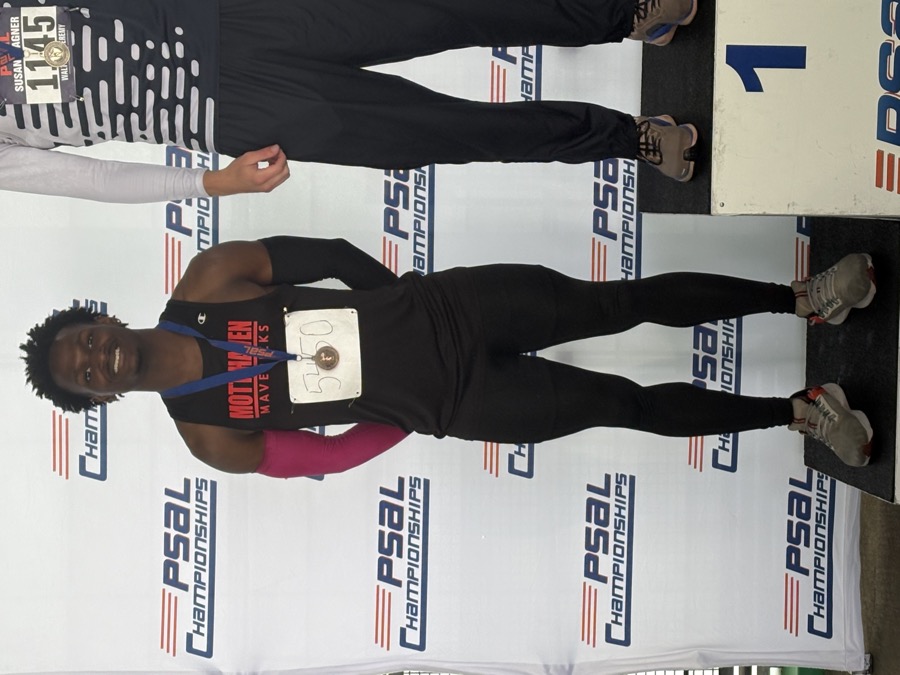 Davon Sneed on the podium with his bronze medal at the PSAL Varsity City Championships