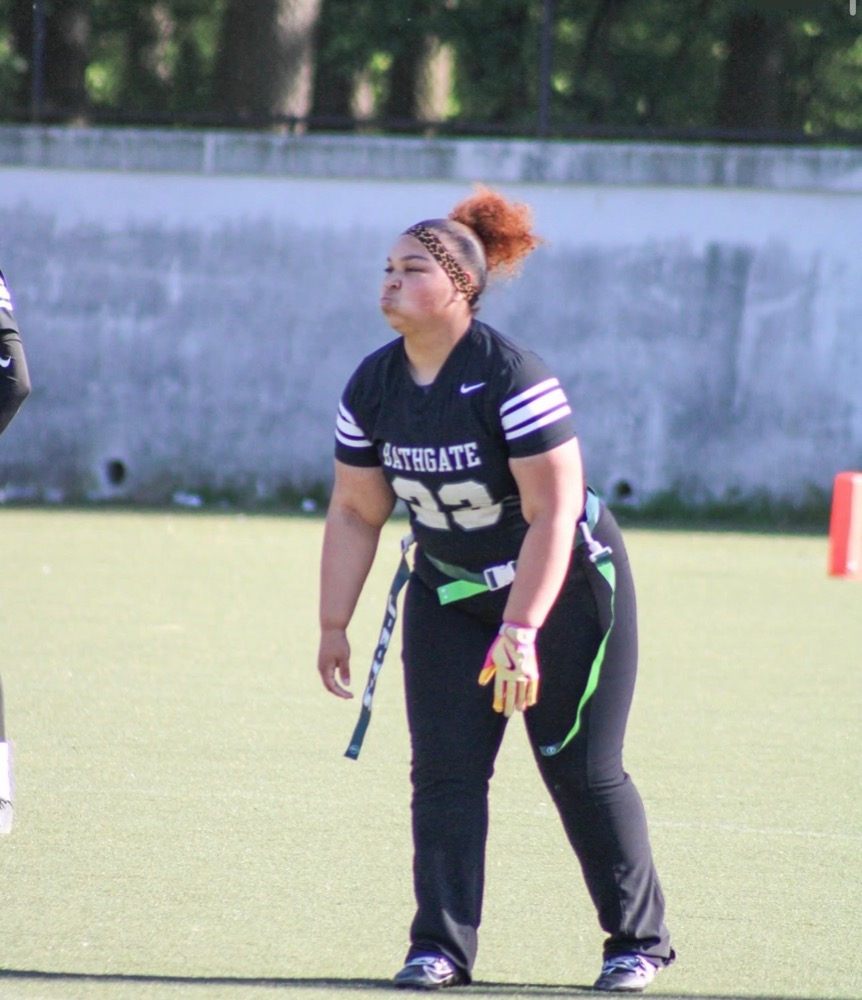 Cloey, #23, competing in girls flag football