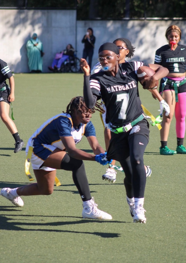 Rokia, #7, competing in girls flag football